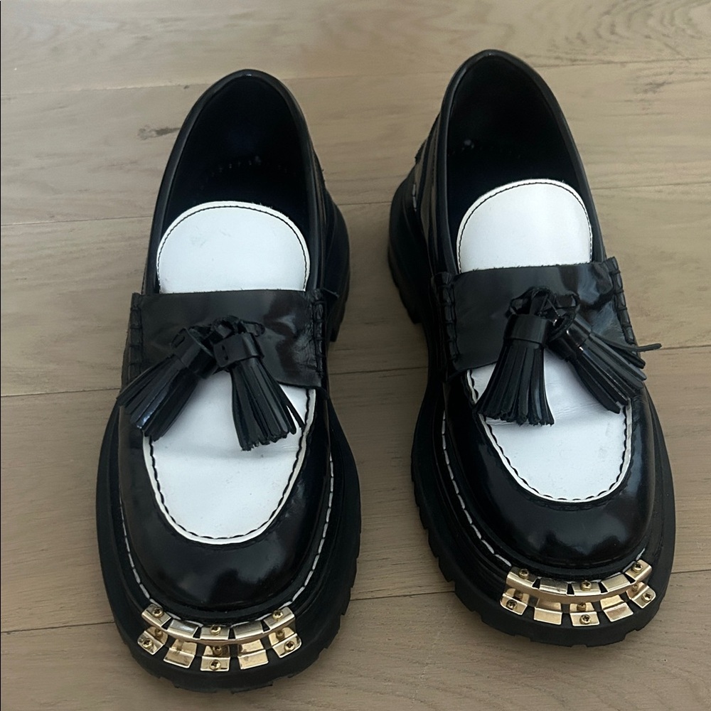 Black and White Loafers with Gold Accents